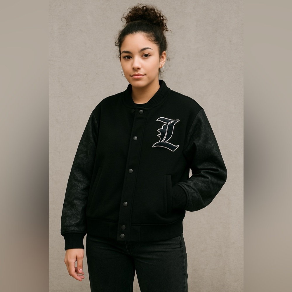 Lita by Ciara leather sleeve letterman style jacket. “Love is the answer”